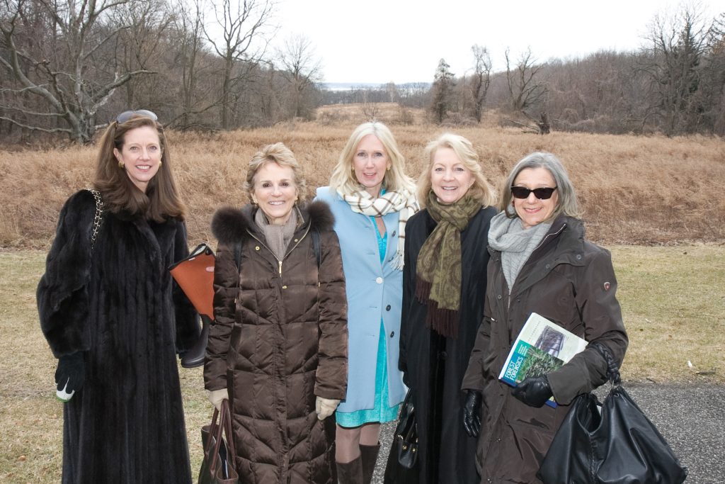 Cynthia McClintock, Warrie Price, Suzanne Clary, Shaun Duncan and Barbara Dixon with 2 acres of mugwort behind them